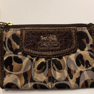 Brown multi-colored coach coin purse